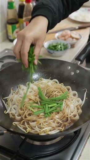 Home Wok Cooking: Making Authentic Stir-Fried Flat Rice Noodles