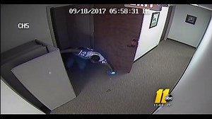 Video: Intruder bursts through office door, gets shot by accountant inside