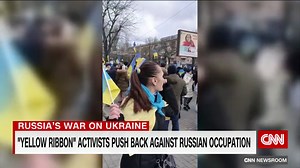 Ukraine's \"Yellow Ribbon\" activists push back against Russian occupation
