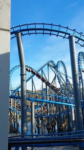 Full offride of Blue Hawk at Six Flags Over Georgia. @sixflagsovergeorgia Vekoma looping coaster featuring a rare butterfly loop and a double corkscrew | Thoosie Views
