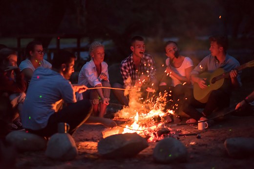 8 Campfire Games Made for Adults (And Maybe a Few Drinks)
