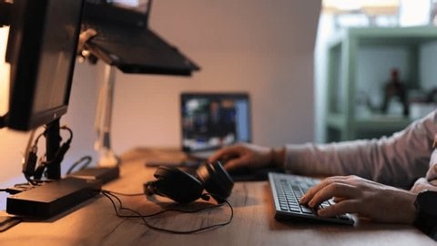 clip-3963721593-adult-working-home-person-typing-on-laptop