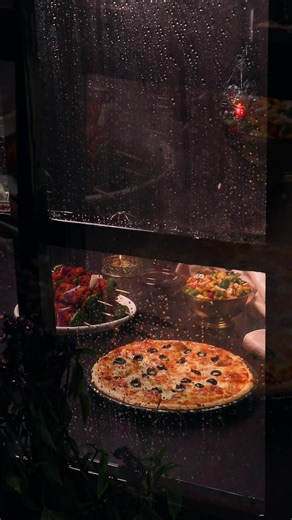 When it rains, Tehzeeb Pizza pours happiness onto your plate. #tehzeeb #pizza #snack #rainyday #islamabad #lahore | Tehzeeb