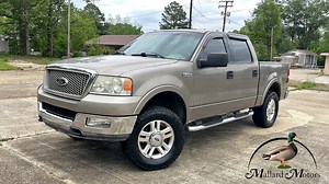 🤍 2004 Ford F-150 Lariat 4x4 🤍 🔥🔥Trade-In Alert!!! 🔥🔥 Brand New Head Gaskets and Timing Job! 💪 5.4L V8 ☀️ Sunroof 💺 Leather Seats 🔥 Heated Seats 📻 AM/FM Radio 🔦 LED Fog Lights ✅ Push Bar ⭕ All Terrain Tires 👪 5 Passenger Capacity 🚔 Tow Mirrors 🥾 Power Adjust Foot Pedals 🪜 Step Rails 👉 Get Approved Now: http://MallardMotors.com/Approved 👈 Questions? Message, Call or Text: 870-639-9200 - #TrustTheDuck Located @ Mallard Motors - 701 E Main St. El Dorado, | Mallard Motors