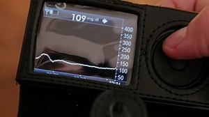 clip-1023743794-checking-glucose-level-on-dexcom-receiver-real-time