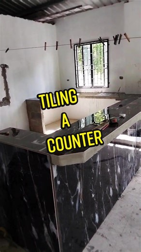 Tiling a Kitchen Counter with Porcelain Slab Tiles