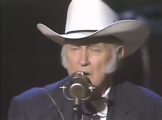 Bill Monroe - The Wayfaring Stranger (Live) (1958) Born in 1911 in Rosine, Kentucky, Bill Monroe is celebrated as the "Father of Bluegrass." His musical journey began in childhood, influenced by his family, especially his mother Malissa and uncle Pendleton Vandiver. Monroe's blend of folk, country, and gospel music led to the creation of bluegrass, known for its fast tempos, soaring vocals, and outstanding instrumentals. His performance of "The Wayfaring Stranger," a classic American folk song f