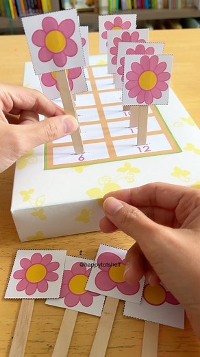 Fynn Sor | Happy Tot Shelf on Instagram: "Get these FREE Counting Flowers printables to work on number recognition and counting. 🌸 ⭐️ There are two versions available: 👉🏻 For toddlers (2-3 year olds), this printable is designed to practise number recognition. Count as you plant each flower to work on counting too! 👉🏻 For our preschoolers (4-5 years old), practise 1 to 1 correspondence counting by counting the number of petals on each flower 🌸 Comment FLOWERS and I will send you the link to