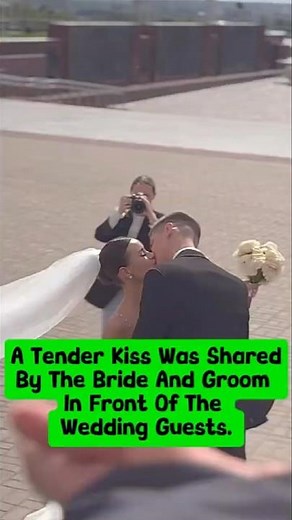 A Tender Kiss Was Shared By The Bride And Groom In Front Of The Wedding Guests. #wedding