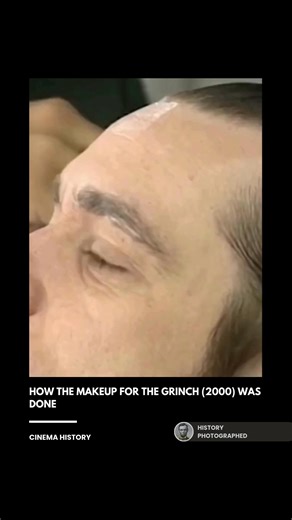 The elaborate makeup for the 2000 film How the Grinch Stole Christmas involved full facial prosthetics, a suit made of dyed yak hair, and oversized contact lenses, which initially took Jim Carrey over eight hours to apply. The process was so physically and mentally grueling that Carrey, who reportedly felt like he was "being buried alive," required training from a specialist who teaches CIA agents torture-resistance techniques just to endure the daily application and filming. Credit: Universal P