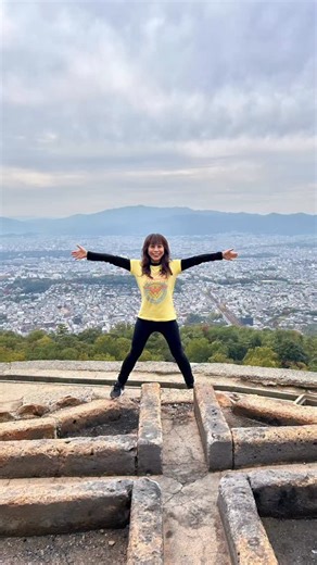 Wonder Woman spreads her arms and legs wide.  The Japanese Kanji for big, 大 dai. Hiking Mount Daimonji in Kyoto! There were a lot of steep stairs. 大文字焼きの山、登ってきました！ 紅葉も綺麗! #tomokotomoko #videocomingsoon #hiking #kyoto #daimonjiyama | tomokotomokotomoko | Facebook