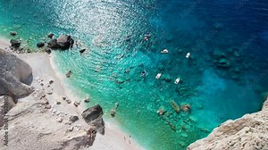 Aerial view of Zakynthos Greece Limni Keri rock island. Sunrise. Mizithres limestone formation in sea. Myzithres, Europe, Ionian sea. Turquoise clear blue water with white sands and green cliffs