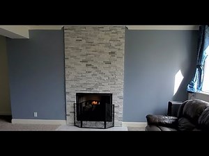 How to install stone around a fireplace