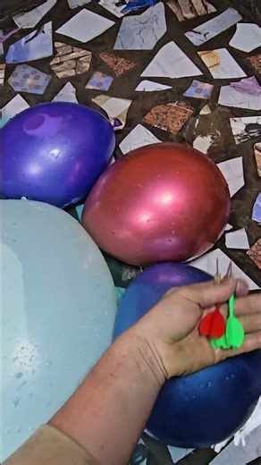 Balloons Bursting in Slow Motion