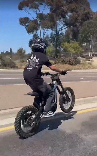 Surron, mountain bike wheelies!!!!