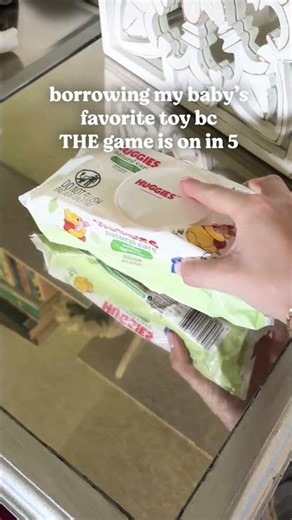 Replacing his favorite toy with his favorite wipe 🙂‍↕️(so I can watch my favorite team)🏀