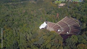 Summer Olympic Games 1936. magic aerial view flight pedestal down drone of Open-air stage Waldbühne Berlin Germany at summer day 2022. 4k marnitz cinematic