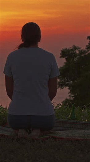 clip-3996896627-vertical-video-rear-view-woman-sitting-on