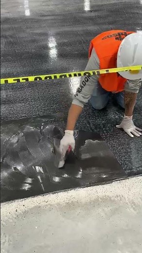Installer Applying Staticworx Epoxy Adhesive