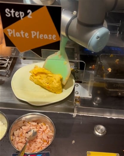 The machine even flips your omelet before plating up 🤯🤩 | FOODbible