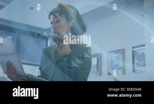 Animation of round scanner over asian woman holding laptop talking on smartphone at office. Computer interface and business technology concept Stock Video Footage - Alamy