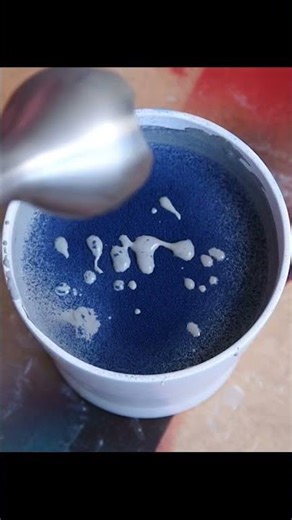 mixing blue clay