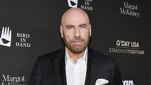 John Travolta channels 'Pulp Fiction' twist scene in holiday ad with Samuel L. Jackson