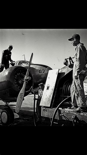 Ground crew using a fuel truck to refuel a Curtiss-Wright AT-9A, February 1943. #WW2 #military #aviation #pilot #aircraft | World War II Aircraft