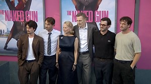 Pamela Anderson and Liam Neeson supported by sons at premiere