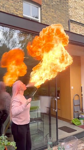 cleanbandit on Instagram: "Watch me learn how to fire breath (aka, become the best dragon you’ve ever seen). This was my first time fire breathing - thank you Lotte for teaching me! ❤️‍ Ps. Please do not try this at home! #firebreathing"