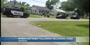 Woman cuffed while videoing traffic stop; police say they believed she was a suspect