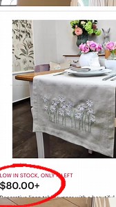 4.5K views · 191 reactions | Can I dupe this $80 Etsy table runner for less? I am using a runner of flowers and ribbon that I purchased from Hobby lobby. Instead of sewing my items to the runner, I’m using fabric glue. this runner was so easy to do. It was very affordable and in my opinion it looks better than the inspiration table runner. Watch and see how much I saved! #dining #springdecorating #etsy #spring #decor #diy #hobbylobby #tableware | Lisa Burningham | Facebook