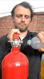 Why does the bottle start to collapse? #scientificexperiments #science #plasticbottles | Steve Mould