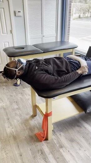 McKenzie Supine Cervical Retraction extension with towel