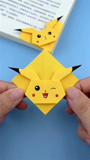 Crafty|Aesthetic Handmade Projects on Instagram: "✨📚 Add a spark of Pokémon magic to your reading! ⚡🐭 Watch how to make this super cute Pikachu bookmark at home! . . . #DIY #PikachuBookmark #DIYBookmark #PikachuDIY #PokemonCraft #CuteBookmark #PaperCraft #BookmarkIdeas #CreativeDIY #CraftReels #ViralReels #HandmadeBookmark #TrendingCraft #CraftIdeas"