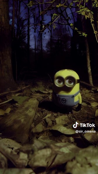 Minion Toy Showcased in Beautiful Forest Scenery