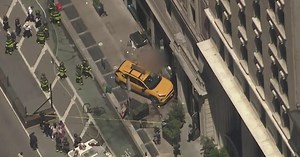 6 hospitalized after taxi jumps curb in NYC
