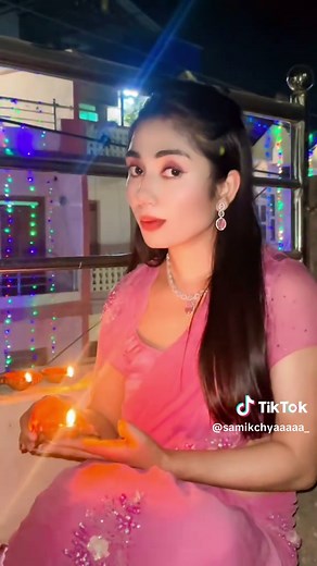 Traditional Diya Lighting Ceremony at Night