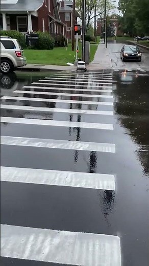 Delivery Robot Gets Struck by Turning Car While Crossing Road - 1421913