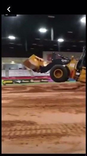 Loader operator jumping a John Deere 624k
