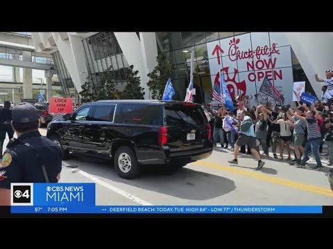 Video shows a protester tackled after getting in front of former President Trump's motorcade