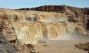 ‘Chocolate waterfall’ roars to life after summer storms