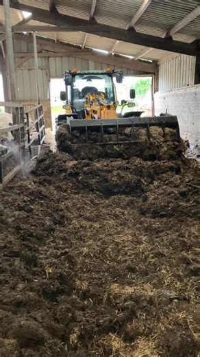 Yellow Tractor in Action: Straw Loader Demonstration