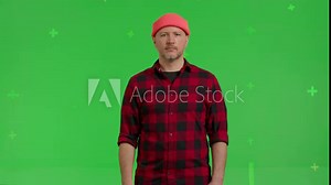 Man saying no by shaking his head . Serious male model showing a prohibition gesture with his hands on Green Screen, Chroma Key. 4k video footage