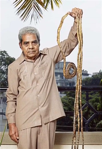 Longest fingernails on a single hand ever - a combined length of 909.6 cm (358.1 in) grown by Shridhar Chillal 🇮🇳