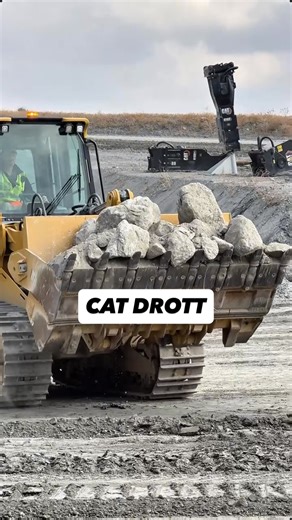 Mining Australia on Instagram: "Caterpillar Drott on the move 👇 Caterpillar has been shaping the construction and mining world for nearly 100 years, with the company starting back in 1925. Machines like this Drott are known for their strength, versatility, and ability to work in some of the toughest conditions on Earth. A Drott (tracked loader) is often chosen over a dozer or a wheel loader for one key reason — versatility. It can push like a dozer, load like a loader, dig like an excavator, an