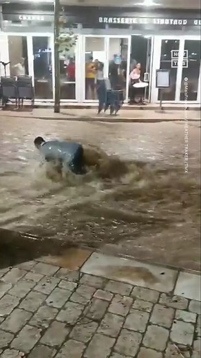 This Cassis, France, resident is showing why you should never underestimate rushing floodwaters, as they tried to cross the street. The footage, posted on August 18, shows a person nearly getting washed away while trying to cross ankle-deep rushing water. Heavy flooding struck Europe in the past week, with parts of Paris receiving 15 days’ worth of rain in a matter of hours on August 17. On the same day in the UK, storms brought flash flooding to London, and Worksop in Nottinghamshire received t
