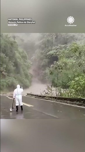 Back Up! Trucker Reverses to Avoid Mudslide in Philippines