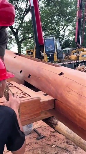 assembling a large wooden structure using traditional joining technique for professional production