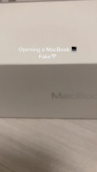 Opening a MacBook: Fake or Real?